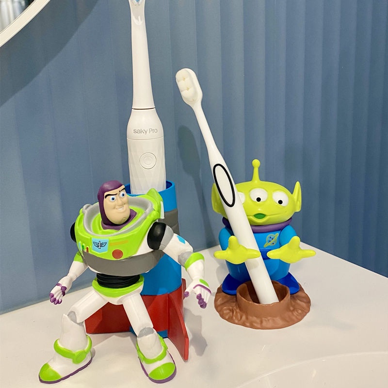 Toy Story Buzz Lightyear ผู้ถือแปรงสีฟันสามตาชั้นวางรูปตุ๊กตาเครื่องประดับผู้ถือปากกา