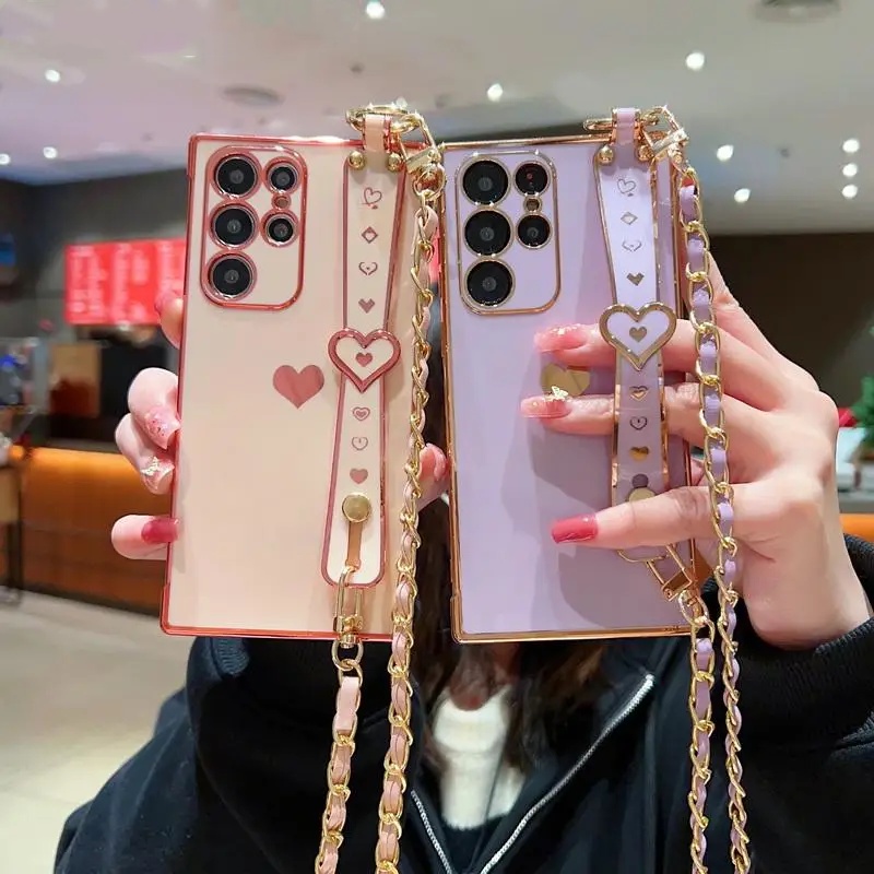เคสโทรศัพท์มือถือแบบนิ่ม TPU กันกระแทก พร้อมสายคล้อง และที่ตั้งวาง และสายคล้อง หรูหรา สําหรับ Samsung S24 S23 S22 Ultra Plus S23 S21 S20 FE ราคา ถูกที่สุด ดีลบีเคเค รูปภาพหลัก