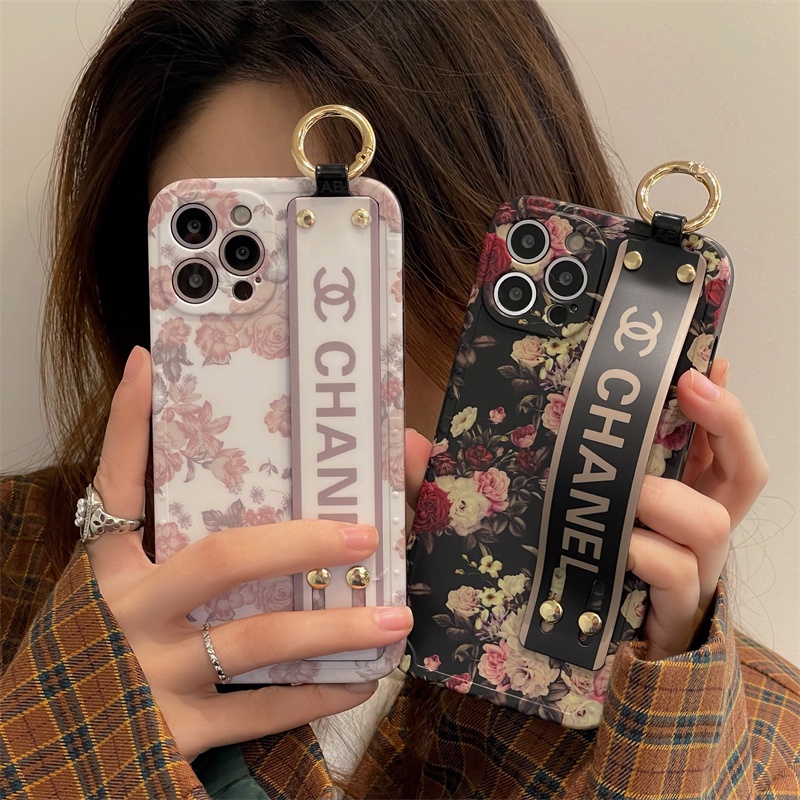 เคสโทรศัพท์มือถือ ซิลิโคนนิ่ม กันกระแทก ปิดด้านหลัง ลายดอกไม้ DION พร้อมสายรัดข้อมือ แฟชั่นฝรั่งเศส สําหรับ iPhone 11 12 13 14 15 Pro Max