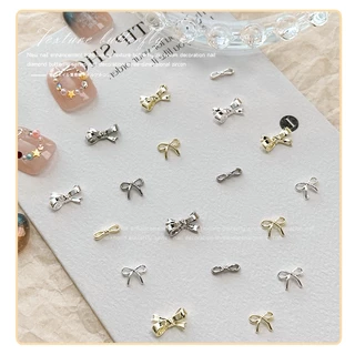 อุปกรณ์ตกแต่งเล็บสีทองและสีเงิน 10 ชิ้น / เครื่องประดับเพชรติดเล็บผูกโบว์คริสต์มาสอเนกประสงค์
