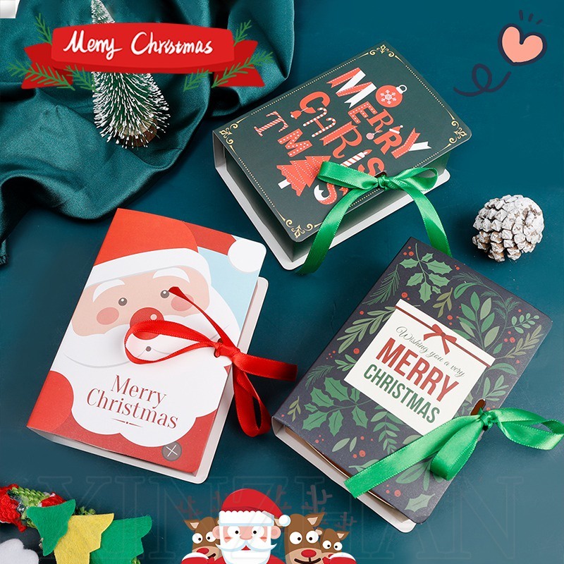 Merry Christmas กล่องของขวัญ ซานตาคลอส / กล่องขนมคริสต์มาส ตกแต่งบ้าน / กล่องขนมคริสต์มาส รูปทรงหนังสือ / อุปกรณ์งานเลี้ยงปีใหม่คริสต์มาส / กล่องบรรจุภัณฑ์ คุกกี้ ช็อคโกแลต ขนมขบเคี้ยว