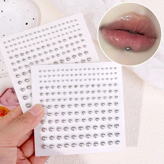 สติกเกอร์ติดจมูกเพชร สีเงิน / แหวนเจาะจมูกปลอม พลอยเทียม มีกาวในตัว / เครื่องประดับร่างกาย แบบไม่ต้องเจาะหู / สติกเกอร์แต่งหน้า สําหรับผู้หญิง DIY