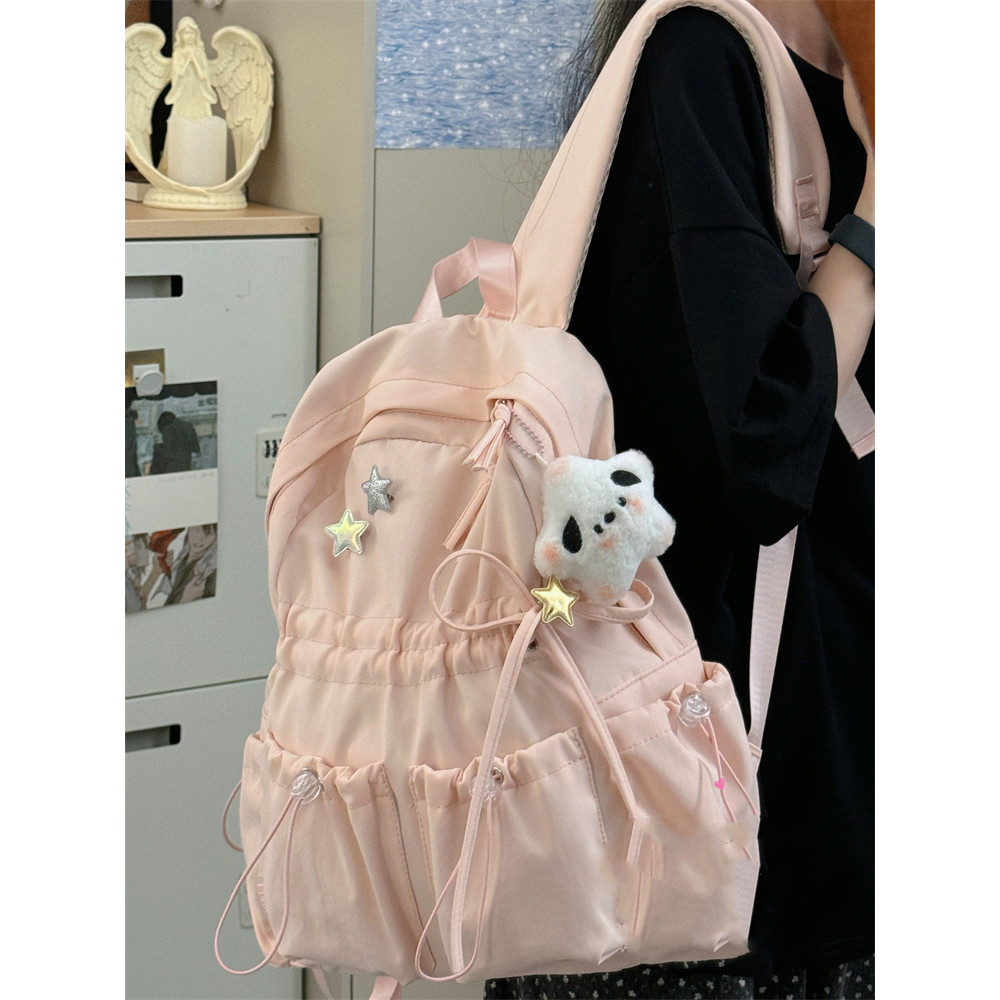 Niche Design Sense Pink Girl Female Temperament Casual ทนทาน All-match อาวุโส High School Students Junior High School Girls Class กระเป๋านักเรียนขนาดเล็กสดกระเป๋าเป้สะพายหลัง – โปรปัง