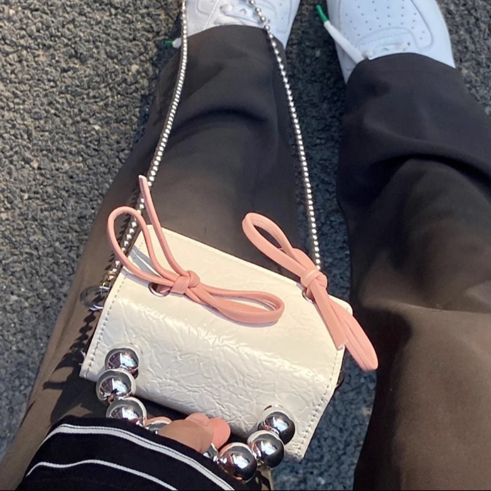 Tonfashion กระเป๋าสะพายไหล่ กระเป๋าถือ หนัง PU ประดับโบว์ ขนาดเล็ก ใส่หูฟังได้ แฟชั่นสําหรับสตรี