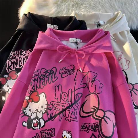 เสื้อกันหนาวแขนยาว มีฮู้ด พิมพ์ลายการ์ตูนคิตตี้ ประดับโบว์ ทรงหลวม สไตล์เกาหลี อเมริกัน เรโทร เหมาะกับฤดูใบไม้ร่วง สําหรับผู้หญิง
