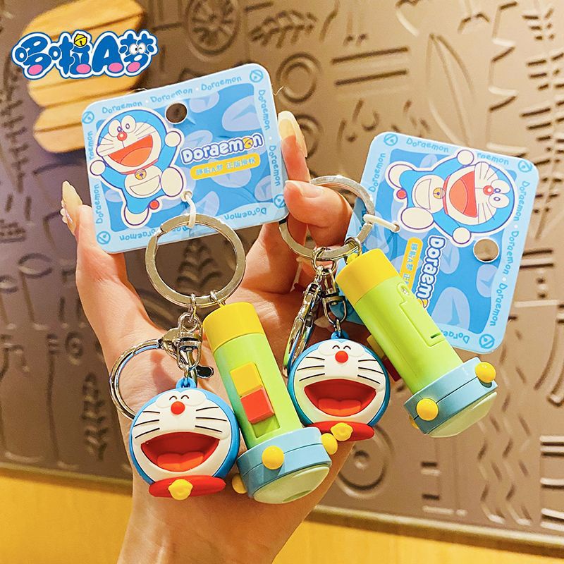 โดราเอมอนไฟฉายขนาดเล็กพวงกุญแจสร้างสรรค์การ์ตูนกระเป๋ารถจี้Insคู่ของขวัญเล็กๆ น้อยๆ