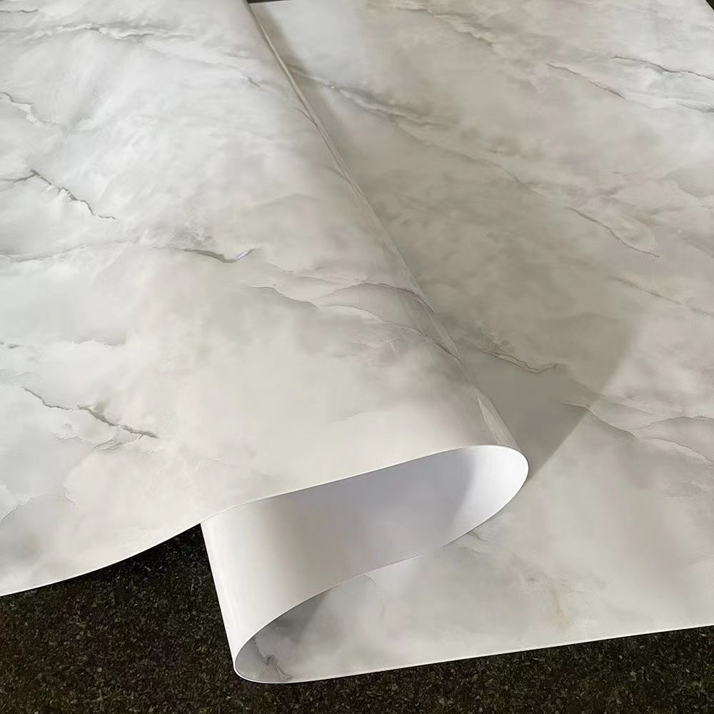 ผ้าปูโต๊ะพลาสติก PVC แบบนิ่ม กันน้ํา กันน้ํามัน ป้องกันน้ําร้อนลวก ลายดอกไม้ สีเทาอ่อน สไตล์ยุโรป 1.0