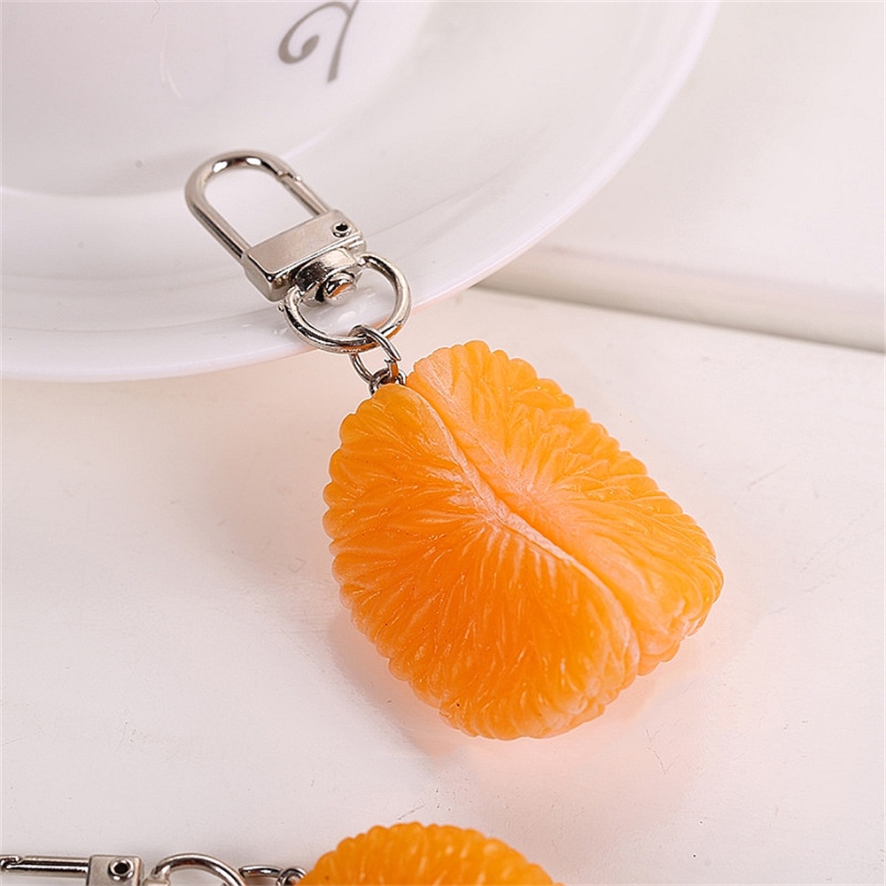 พวงกุญแจ จี้รูปปีกไก่ สีส้ม สําหรับห้อยกระเป๋าถือ กุญแจรถยนต์
