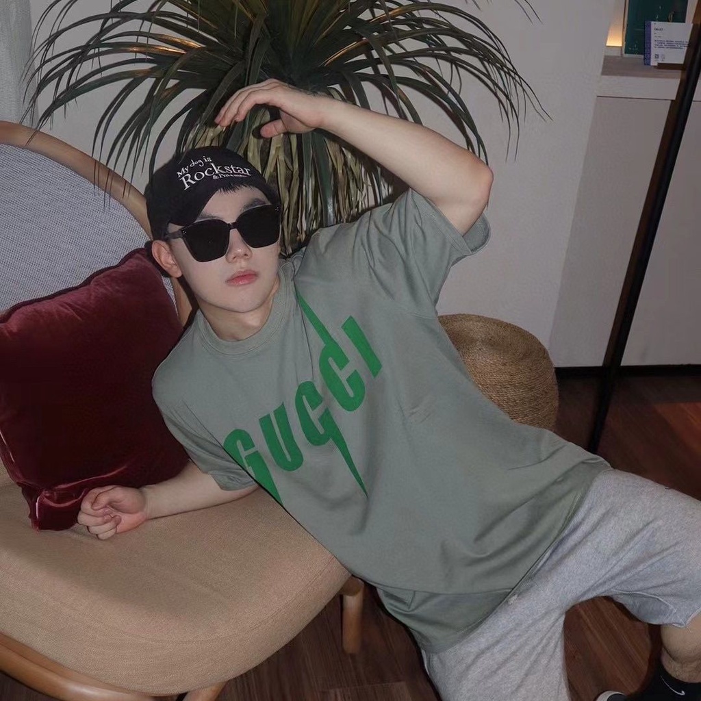 เสื้อยืดลําลอง ผ้าฝ้ายแท้ แขนสั้น คอกลม พิมพ์ลายตัวอักษร และป้ายแท็ก ทรงหลวม เข้ากับทุกการแต่งกาย แฟชั่นคู่รัก