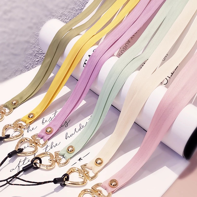 สายคล้องโทรศัพท์มือถือ พร้อมหัวเข็มขัด ป้องกันการสูญหาย สีพื้น แบบสากล ถอดออกได้