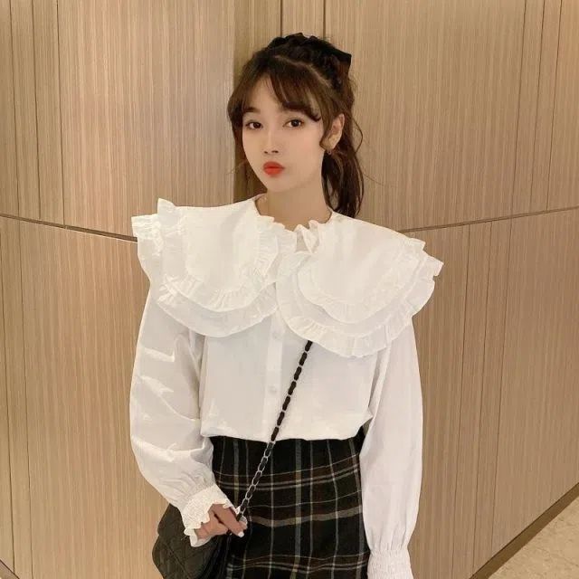เสื้อเชิ้ตแขนกระดิ่ง คอตุ๊กตา สีขาว เข้ากับทุกการแต่งกาย แฟชั่นฤดูใบไม้ร่วง สไตล์เกาหลี สําหรับผู้หญิง