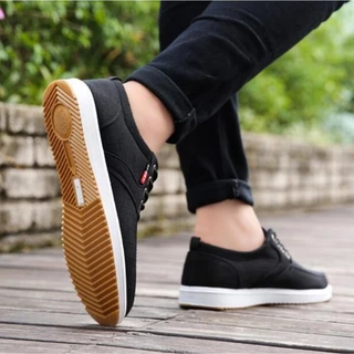 รองเท้าผ้าใบผู้ชาย รองเท้าลำลองแบบผูกเชือก ใส่สบาย กันลื่น Sneakers Men Shoes ไซส์ 39-45