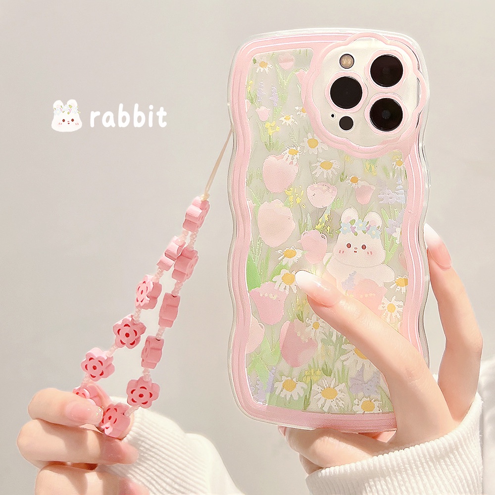 เคสโทรศัพท์มือถือ ซิลิโคน tpu กันกระแทก ขอบหยัก ลายดอกไม้ กระต่าย พร้อมสายคล้อง สําหรับ iphone 11 12 13 14 15 pro max plus x xr xs max 7 8 plus se2020