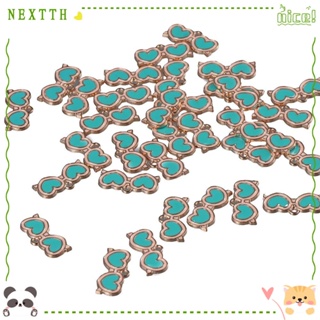 Nextth แว่นกันแดด รูปหัวใจ เคลือบ 20*9 มม. สีชมพู และสีฟ้า ชุบทอง สําหรับทําเครื่องประดับ