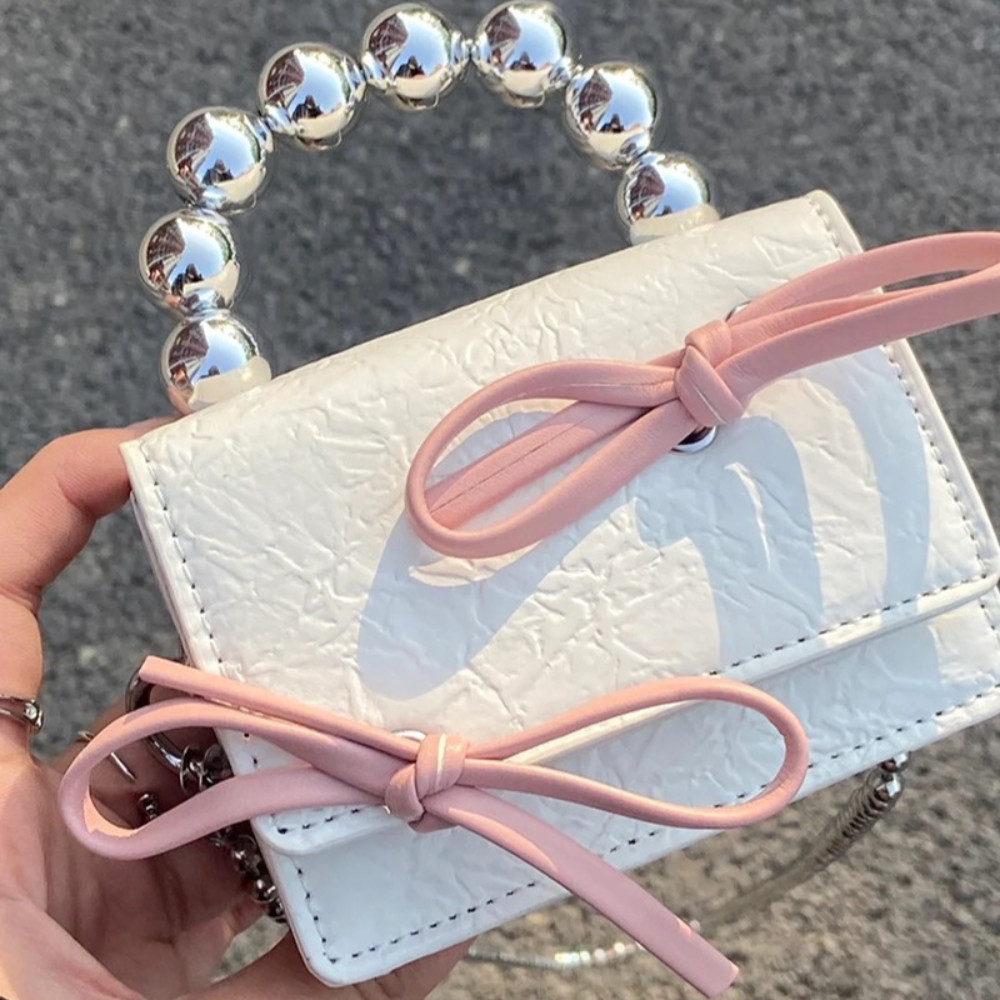 Tonfashion กระเป๋าสะพายไหล่ กระเป๋าถือ หนัง PU ประดับโบว์ ขนาดเล็ก ใส่หูฟังได้ แฟชั่นสําหรับสตรี