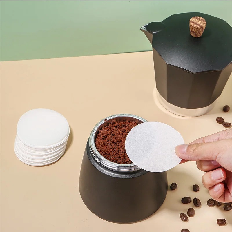เครื่องมือกรองหม้อกาแฟ Moka แบบเทมือ / กระดาษกรองกาแฟ แบบไม่ฟอกขาว / กระดาษกรองกาแฟ ทรงกลม 100 ชิ้น / สําหรับเครื่องชงกาแฟเอสเปรสโซ่ / ตัวกรองชากาแฟ แบบใช้แล้วทิ้ง /