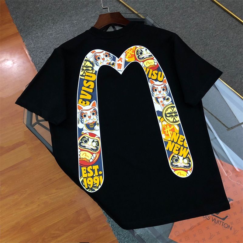 เสื้อยืดแขนสั้นลําลอง คอกลม ผ้าฝ้ายแท้ พิมพ์ลายดอกไม้ Dharma Seagull Big M ทรงหลวม สไตล์สตรีท สําหรับผู้ชาย และผู้หญิง