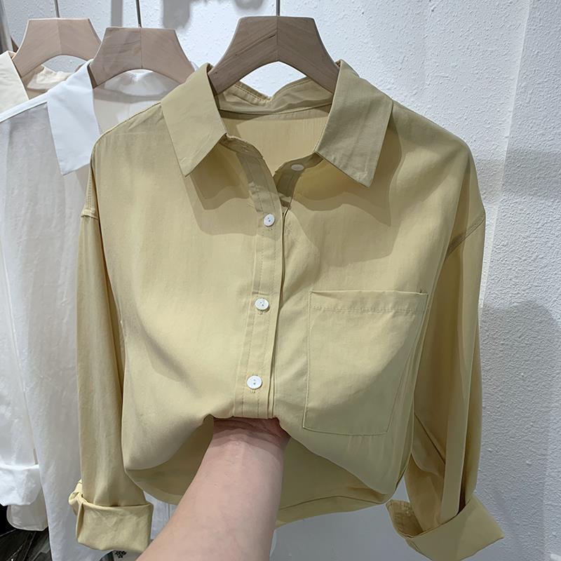 เสื้อเชิ้ตแขนยาวยุโรปฤดูใบไม้ร่วงสไตล์ใหม่เวอร์ชั่นเกาหลีหลวมสบายๆห่านเสื้อสีเหลืองเสื้อผ้าด้านบนพื้นฐาน