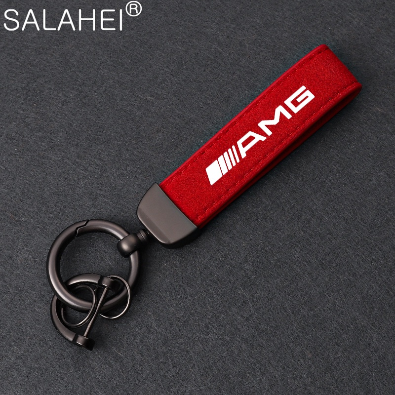พวงกุญแจโลหะรถจัดแต่งทรงผมหนังนิ่มหนังพวงกุญแจ Pendent สําหรับโลโก้ AMG W176 W204 W203 W205 W212 W211 W124 W210 CLA CLK GLK SL ML
