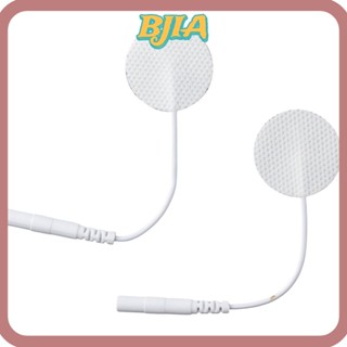 Bja แผ่นอิเล็กโทรดผ้าไม่ทอ ทรงกลม 2.0 มม. สีขาว 1 นิ้ว ใช้ซ้ําได้ แบบเปลี่ยน สําหรับเครื่องนวด Tens EMS 10 ชิ้น