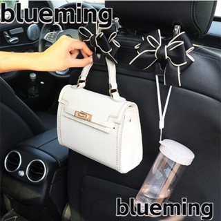 Blueming2 ตะขอแขวนพลาสติก รูปโบว์ อเนกประสงค์ สําหรับติดเบาะหลังรถยนต์ 1 คู่