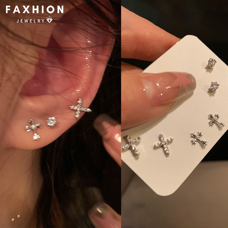 Faxhion Y2K ชุดต่างหูสตั๊ด เพทาย รูปผีเสื้อ หัวใจ ไม้กางเขน สีเงิน เครื่องประดับ สําหรับผู้หญิง 3 คู่ ต่อชุด