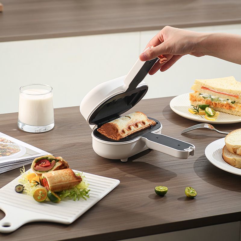 เครื่องทำอาหารเช้า Fanyite เครื่องทำฮ็อตด็อกในครัวเรือนเครื่องทำแซนวิชแบบกดร้อนขนาดเล็กเครื่องทำขนมปังแบบมัลติฟังก์ชั่น