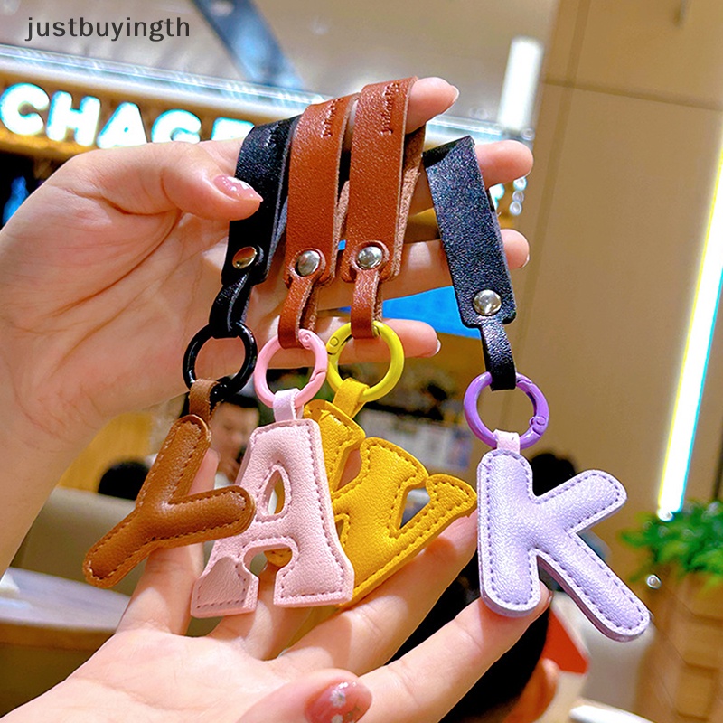 [JBTH] พวงกุญแจ จี้ตัวอักษร A To Z หนัง PU สีแคนดี้ เรียบง่าย เครื่องประดับแฟชั่น สําหรับผู้หญิง [JB]