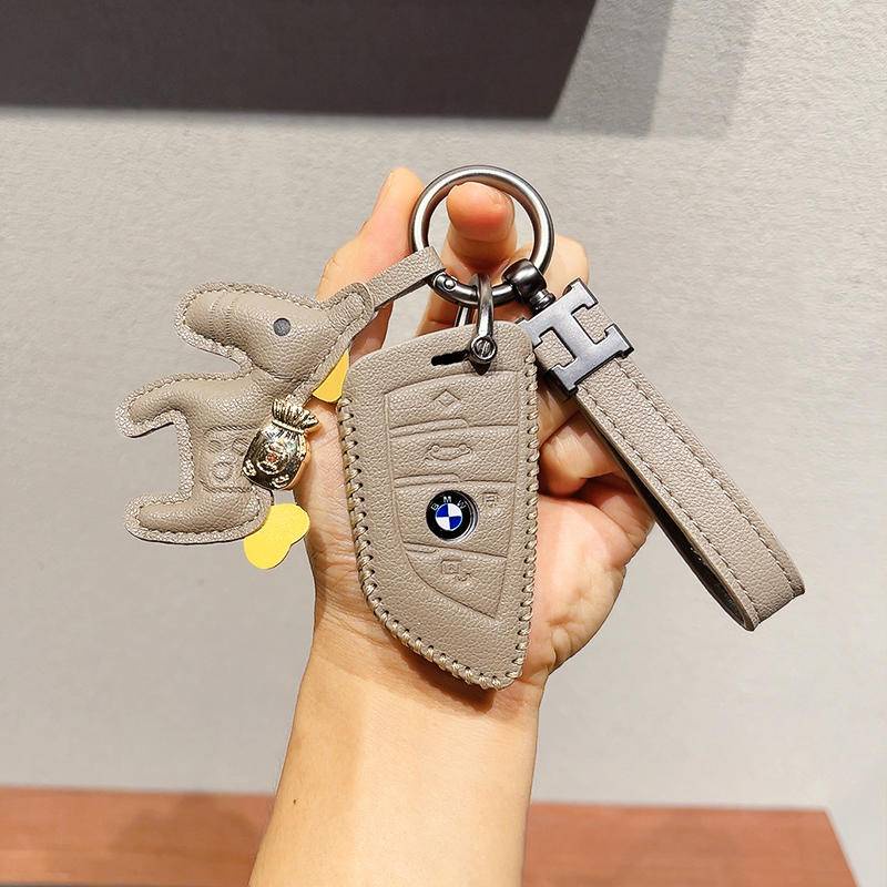 ซองใส่กุญแจรถหนังสำหรับ BMW 7 series 735li 740 X7  i7 X1 ix XM X6 3 series 5 series 530 320li สาม series 1 series x1 x3 x5 ห้า series x2 525 gt กรณีกุญแจรถ พวงกุญแจรถ รีโมทคอนโทรลกรณีกุญแจ ราคา ถูกที่สุด ดีลบีเคเค รูปภาพหลัก