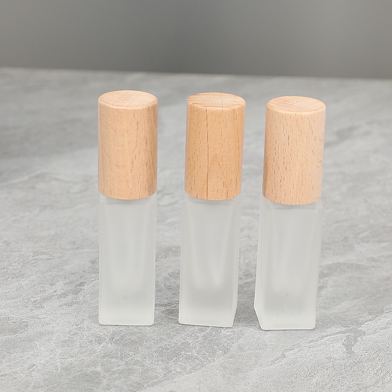 ขวดสเปรย์น้ําหอมเปล่า ทรงสี่เหลี่ยม ขนาด 6 มล. 10 มล. พร้อมฝาปิดไม้บีช แบบพกพา สีขาว เหมาะกับการเดินทาง