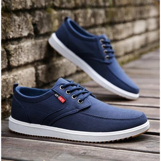 รองเท้าผ้าใบผู้ชาย รองเท้าลำลองแบบผูกเชือก ใส่สบาย กันลื่น Sneakers Men Shoes ไซส์ 39-45