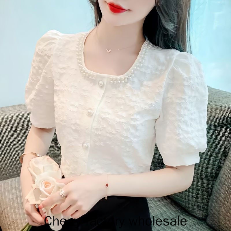 เสื้อท็อปแขนสั้น คอสี่เหลี่ยม ประดับลูกปัด แฟชั่นใหม่ สําหรับสตรี – โปรปัง