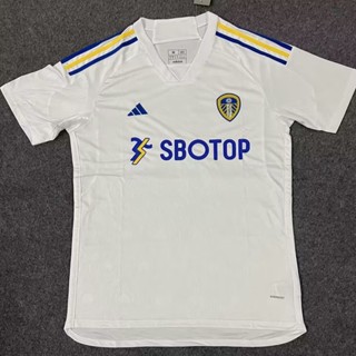 เสื้อกีฬาแขนสั้น ลายทีมชาติฟุตบอล Leeds United 2324 ชุดเหย้า สําหรับผู้ชาย ไซซ์ S-XXL