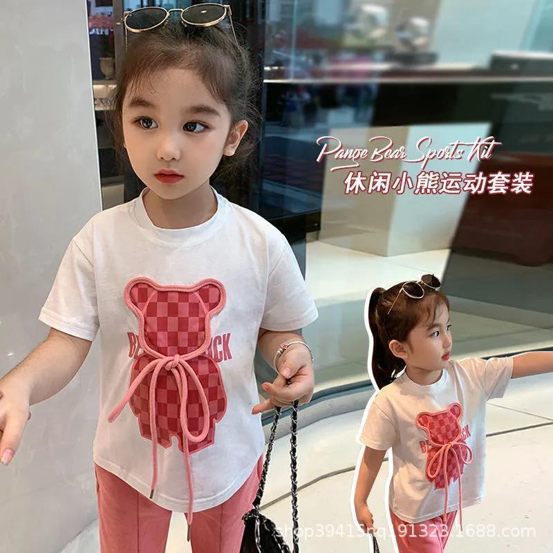 ชุดเด็กผู้หญิงใหม่เสื้อยืดพิมพ์ลายการ์ตูนเกาหลี/กางเกงขาบานเด็กชุดสองชิ้นสไตล์ตะวันตกอินเทรนด์