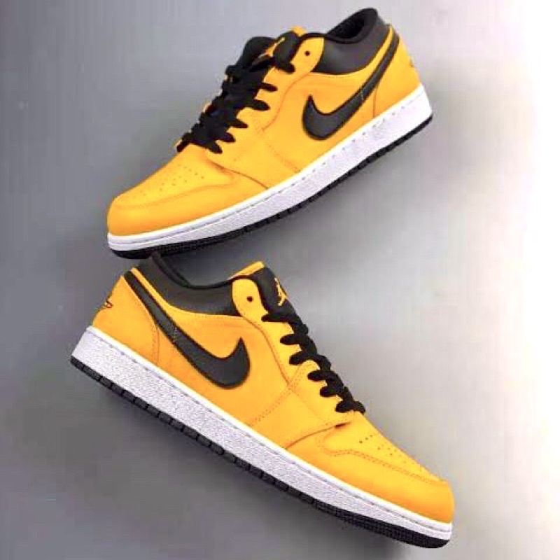 ผ้าใบลำลองที่ขายดีที่สุด AIR JORDAN 1 LOW University Yellow TAXI  OEM เกรดสูงสุด รองเท้า Hot sales