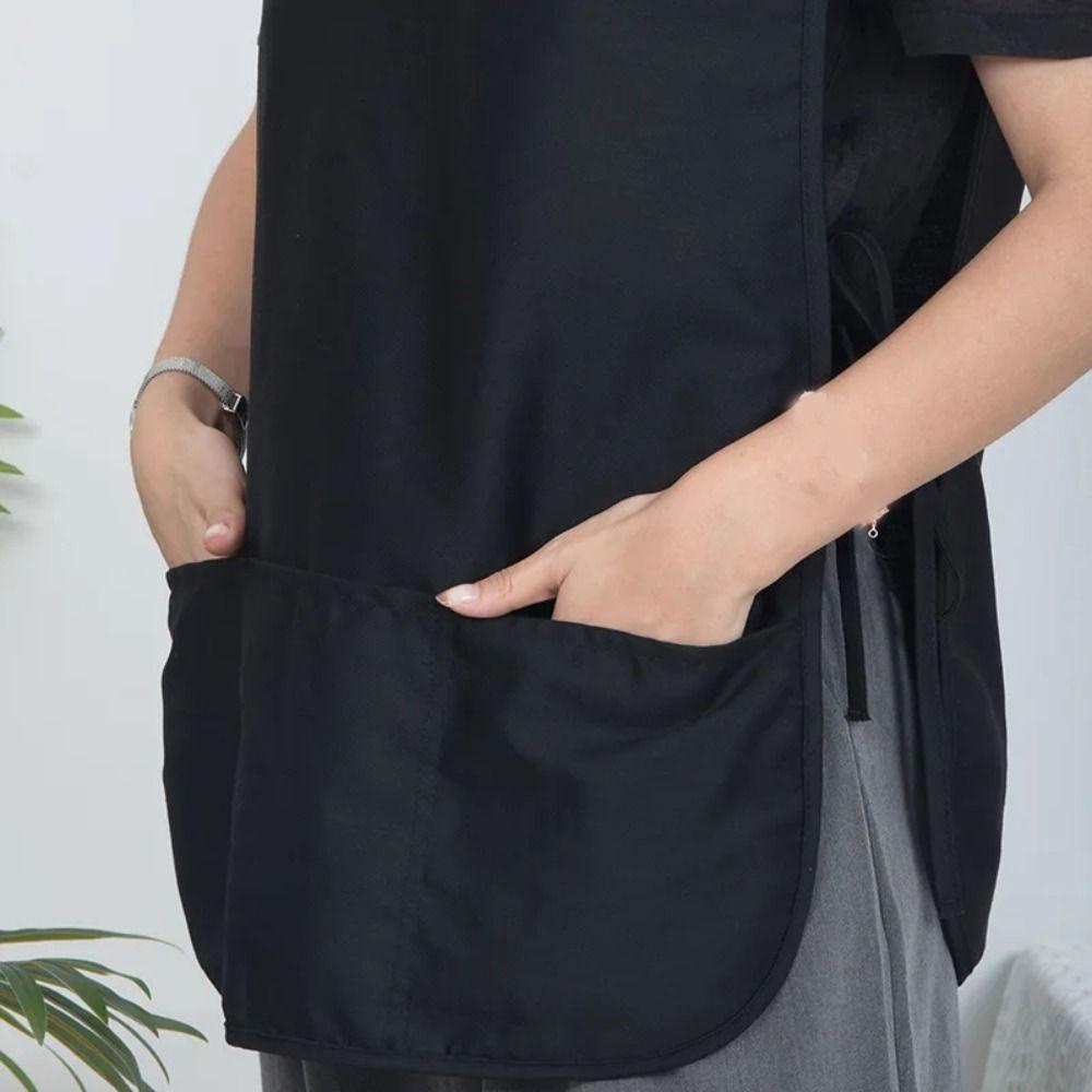 เสื้อคลุมทําผม พี่ชาย เสื้อกั๊กช่างทําผมกันน้ําซักได้พร้อมเสื้อกั๊กสีดํากระเป๋าผ้ากันเปื้อน - รูปที่ 3