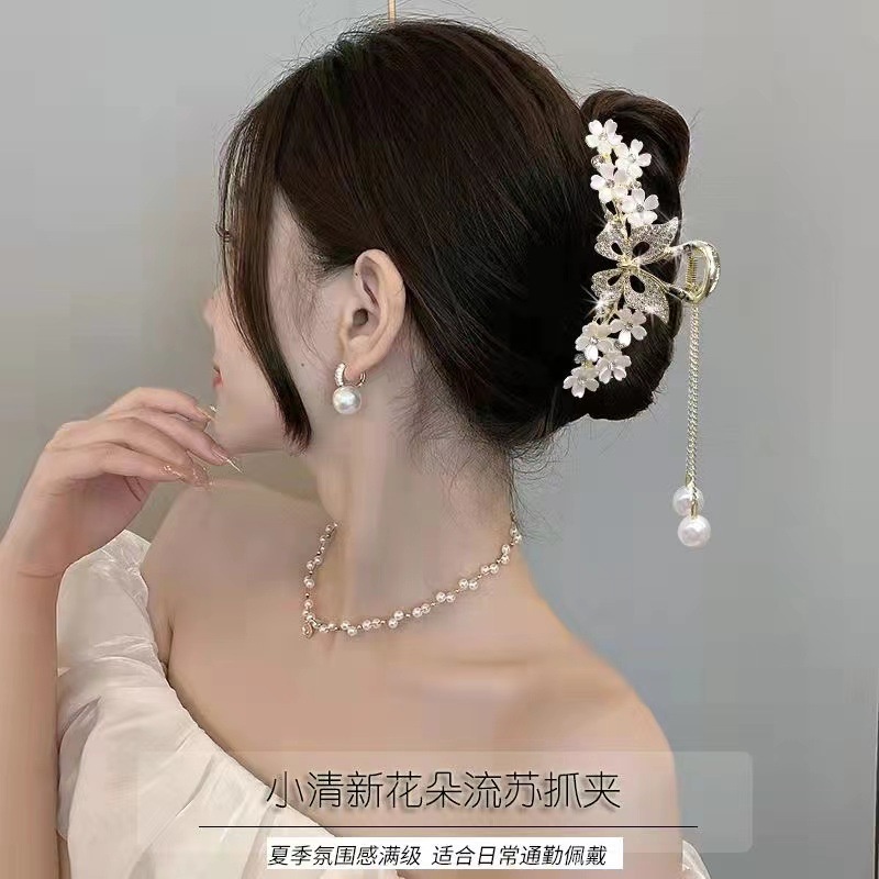2023 ความรู้สึกระดับไฮเอนด์ดอกไม้กลวงผีเสื้อพู่ฉลามคลิป