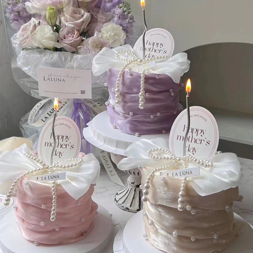 ตกแต่งเค้ก2มมุกสีม่วงสีชมพูล้อมรอบ