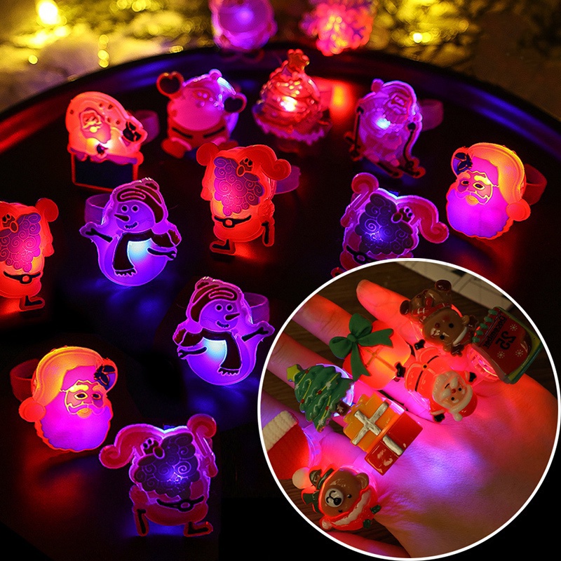 แหวนเรซิน ลายการ์ตูนซานตาคลอสน่ารัก มีไฟ LED เรืองแสง ใช้แบตเตอรี่ สําหรับตกแต่งปาร์ตี้คริสต์มาส ของขวัญเด็ก