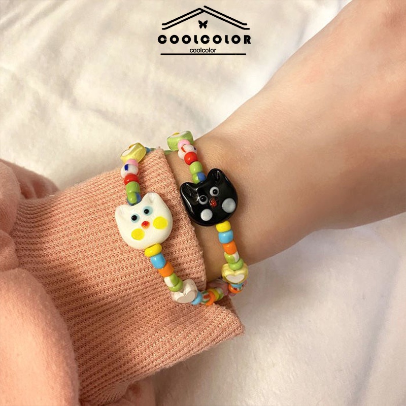 ในไทย สร้อยข้อมือประดับลูกปัดลายแมวน่ารักแฮนด์เมดสีดําสีขาวY2kเครื่องประดับสําหรับผู้หญิงและผู้ชายคู่รักของขวัญ