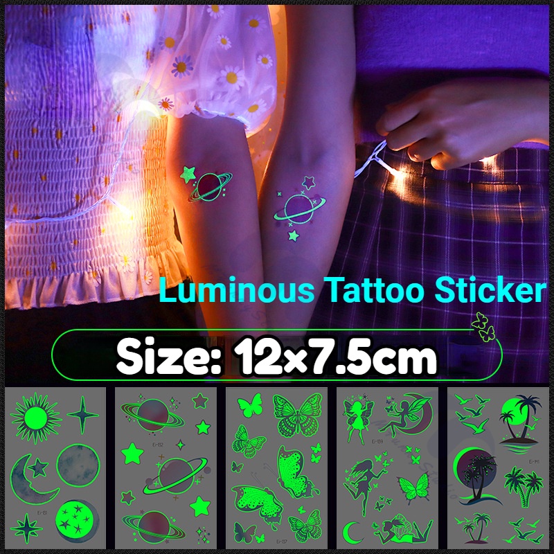 【MF Magic Tattoo】สติกเกอร์รอยสักชั่วคราว ลายดาวเคราะห์ ดวงจันทร์ ดวงอาทิตย์ ดาว ขนนก ผีเสื้อ เรืองแสงในที่มืด สําหรับใบหน้า แขน ขา ร่างกาย