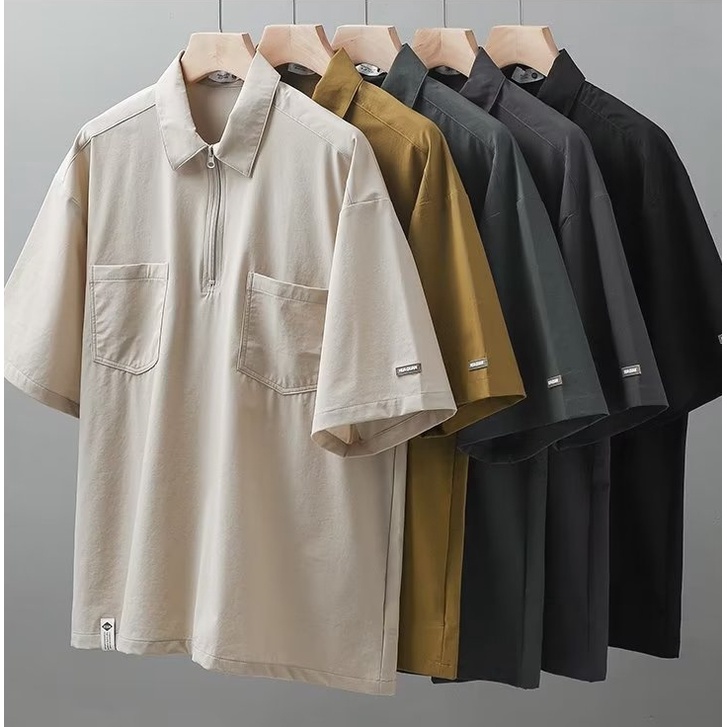 PannoFluxus เสื้อเชิ้ตโปโลแฟชั่นฤดูร้อนสำหรับผู้ชายอินเทรนด์ยอดนิยมสีทึบใหม่แขนห้าส่วน