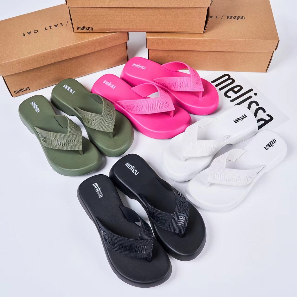 [สต๊อกพร้อม]รองเท้าเจลลี่สไตล์ใหม่หนาSoled Flip-flopsรองเท้าชายหาดลิ่มผู้หญิง