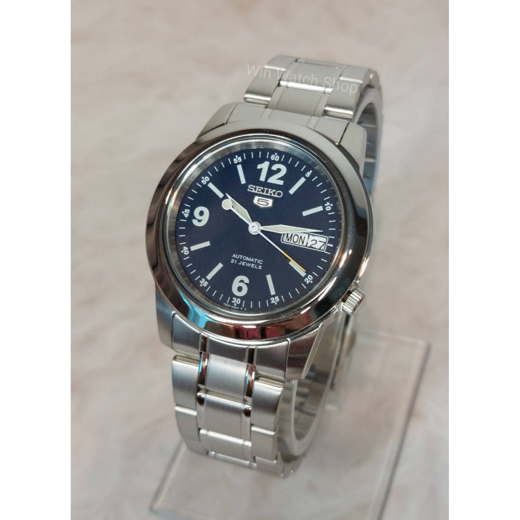 SEIKO 5 Automatic รุ่น SNKE61K1 นาฬิกาข้อมือผู้ชายสายแสตนเลส สีเงิน หน้าปัดสีน้ำเงิน - ของแท้ 100%