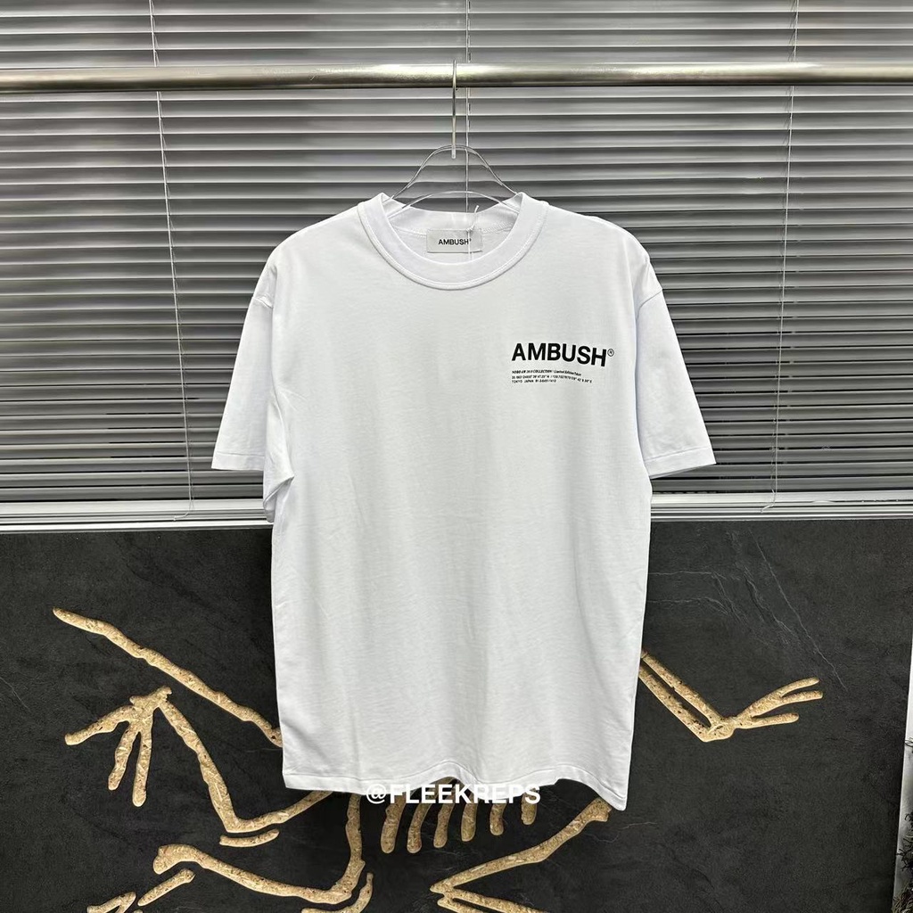 Ambush เสื้อยืดแขนสั้น พิมพ์ลายโลโก้โมโนแกรม แฟชั่นคู่รัก สําหรับผู้ชาย และผู้หญิง