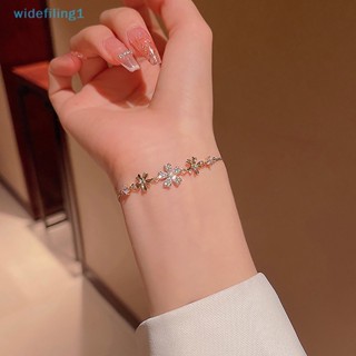 Widefiling1 สร้อยข้อมือ ประดับโอปอล พลอยเทียม ลายดอกไม้ สีทอง ขนาดเล็ก ปรับได้ เครื่องประดับ สําหรับผู้หญิง งานแต่งงาน ปาร์ตี้ ของขวัญ