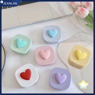 Jeanlan คอนแทคเลนส์ เครื่องสําอาง คอนแทคเลนส์ รูปหัวใจ สีแคนดี้ แบบพกพา พร้อมกระจก พลาสติก กล่องเก็บคอนแทคเลนส์ ผู้หญิง เด็กผู้หญิง