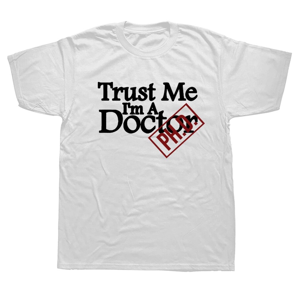 ตลก Trust Me IMA Doctor Phd T เสื้อกราฟิกผ้าฝ้าย Streetwear แขนสั้น O-คอ Harajuku Hip Hop Medic นักเ