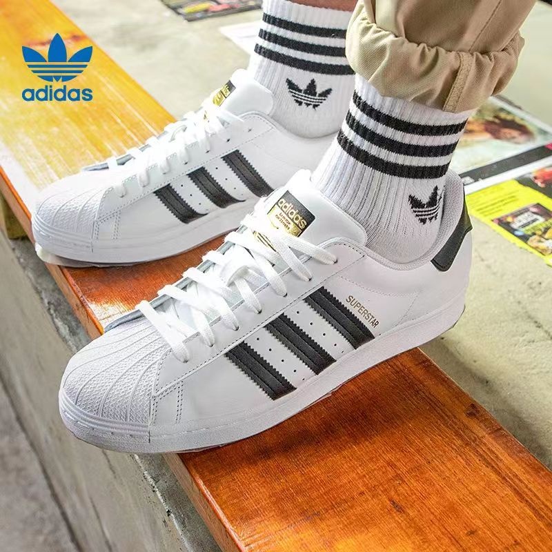 Adidas รองเท้าวิ่งสีขาวทั้งหมด Original สำหรับผู้หญิงและผู้ชายรองเท้าผ้าใบสีขาวทั้งหมด รองเท้า
 lig