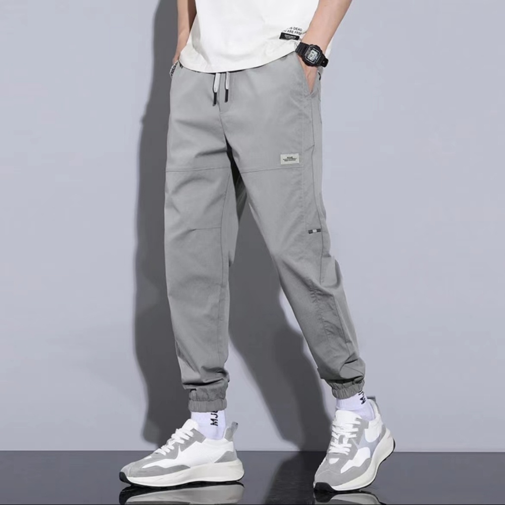 BeCoolMan ฤดูใบไม้ร่วงและฤดูหนาวใหม่สไตล์ญี่ปุ่นย้อนยุคกางเกงลำลองผู้ชายหลวมทุกการแข่งขันขาผูก hallen กางเกง